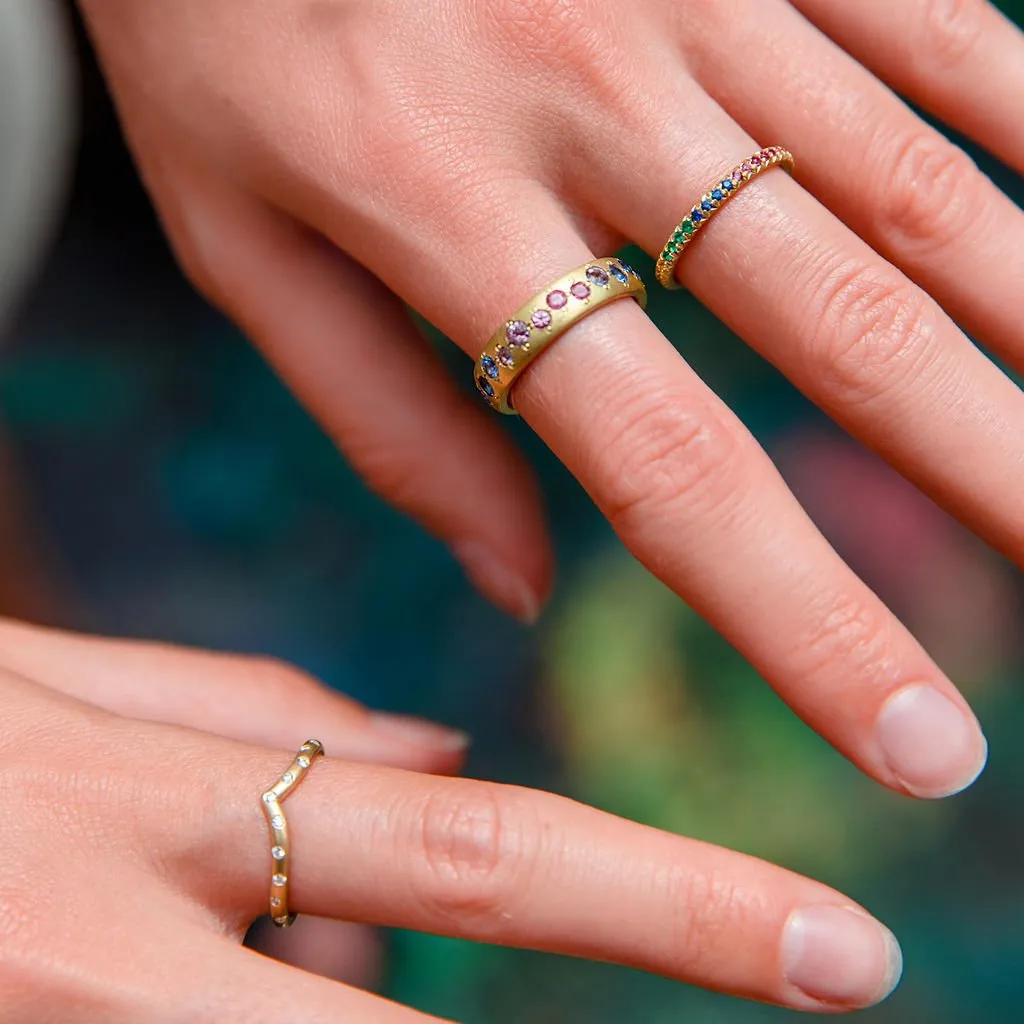 V-Shaped Ring with Scattered Diamonds